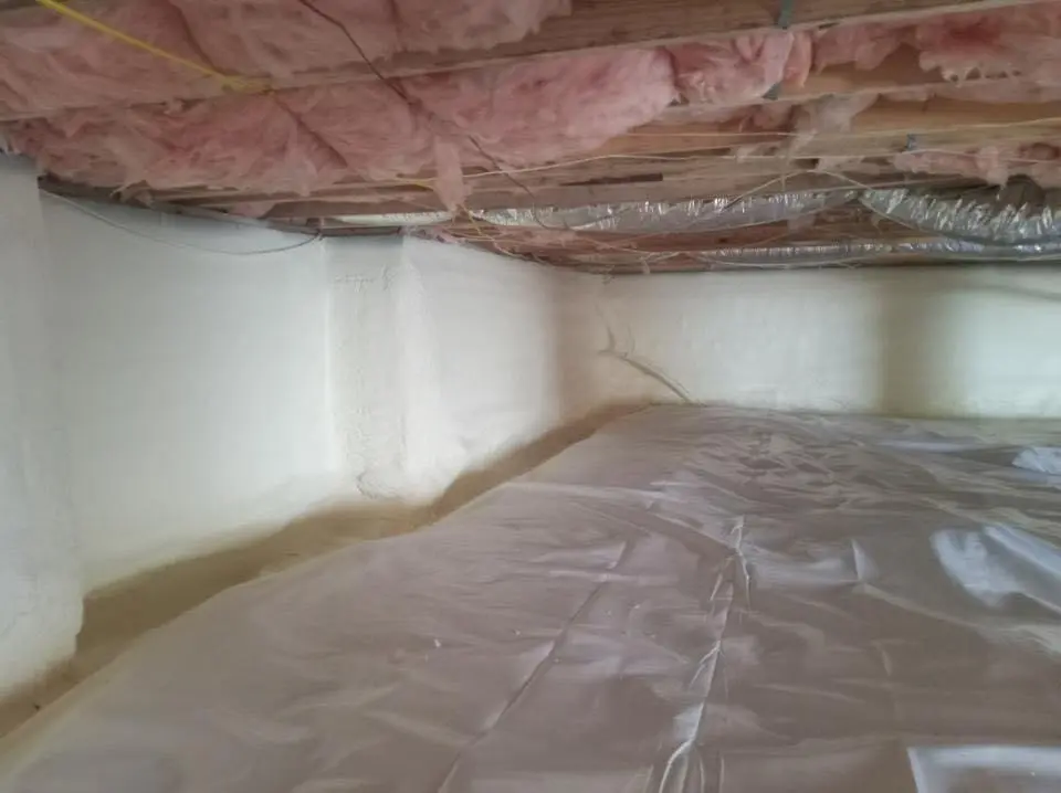 Crawl space encapsulation with closed-cell spray foam for Flat Roof Repair in Paola